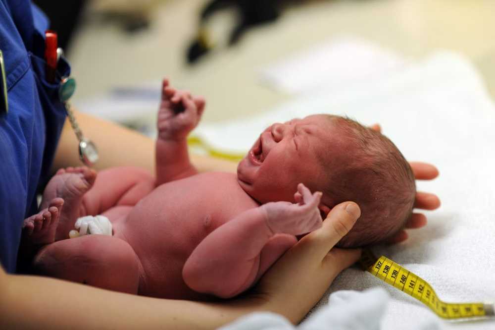 Heart-touching Still-Photo makes people feel good Baby came into the world with brain tumor / Health News