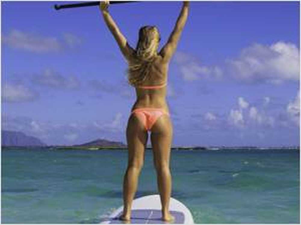 SUP yoga på flytande stå upp paddle board / Hälsa nyheter